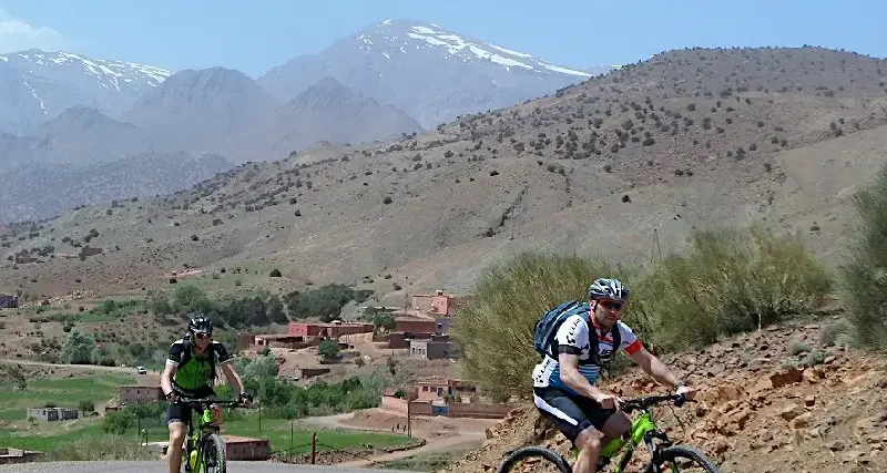 Morocco Cycling Tour through the Atlas Mountains near Berber villages