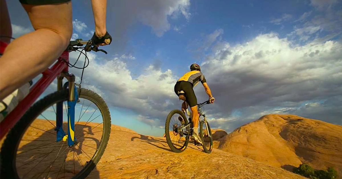 Cyclists on bike tours in Morocco, part of guided Morocco cycling tours through desert and scenic landscapes