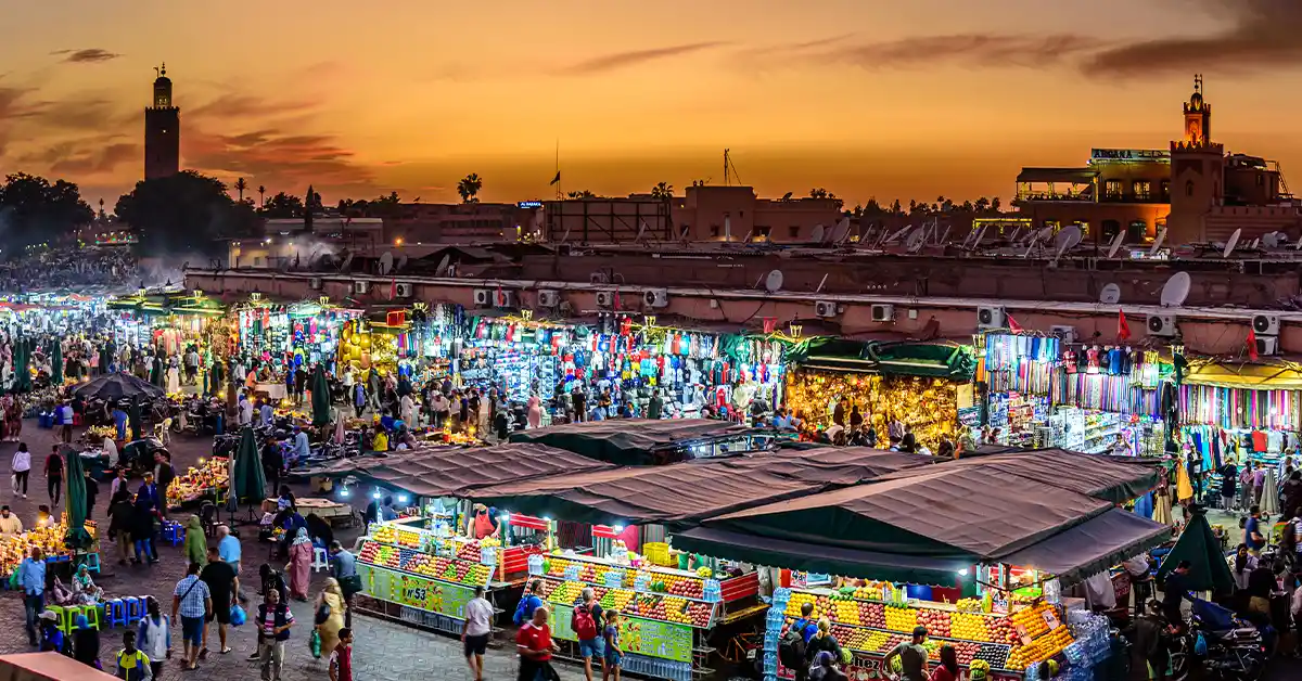 sunset with tangerine sky during Marrakech tours