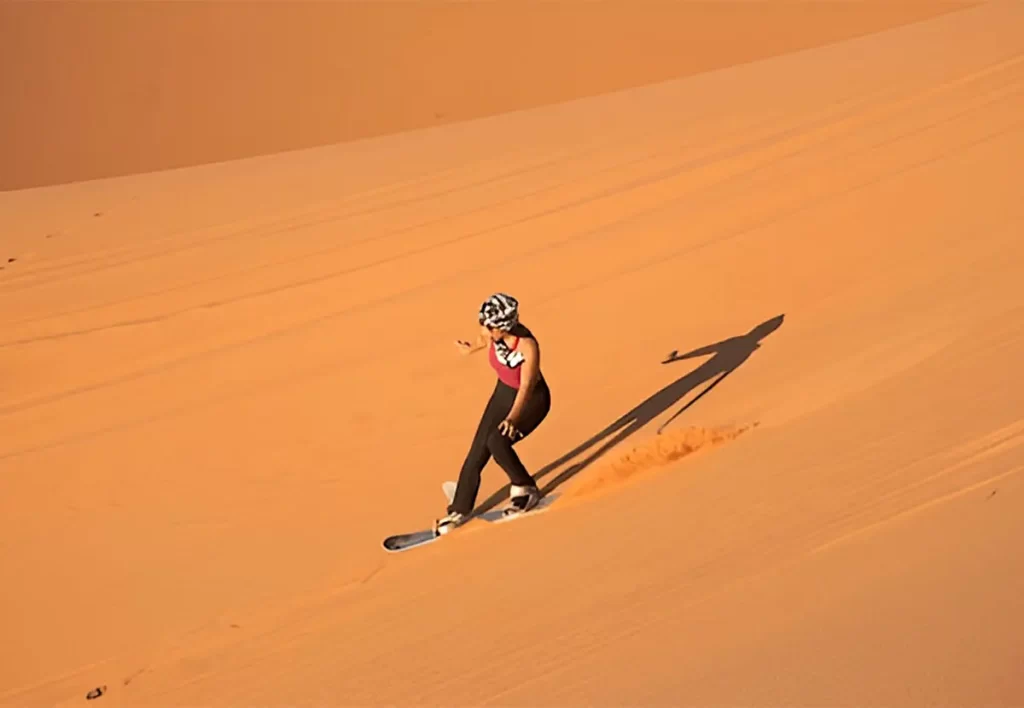 Sand Boarding in morocco desert 