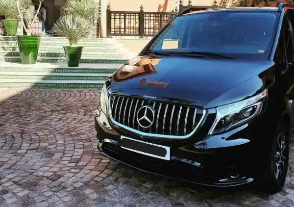 Private minivan in black as one of EMT vehicles