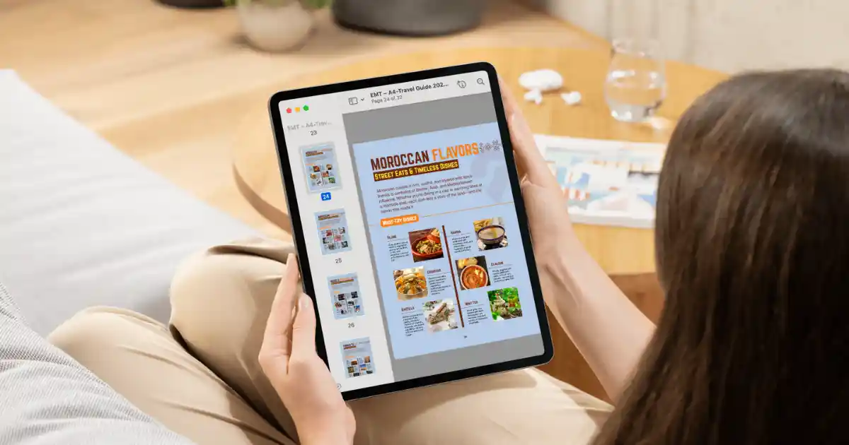 Reader viewing the Morocco travel guide 2026–2027 on a tablet, Moroccan food section open.