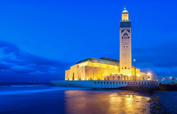 Morocco tours from Casablanca featuring Hassan II Mosque on the Atlantic coast at sunset